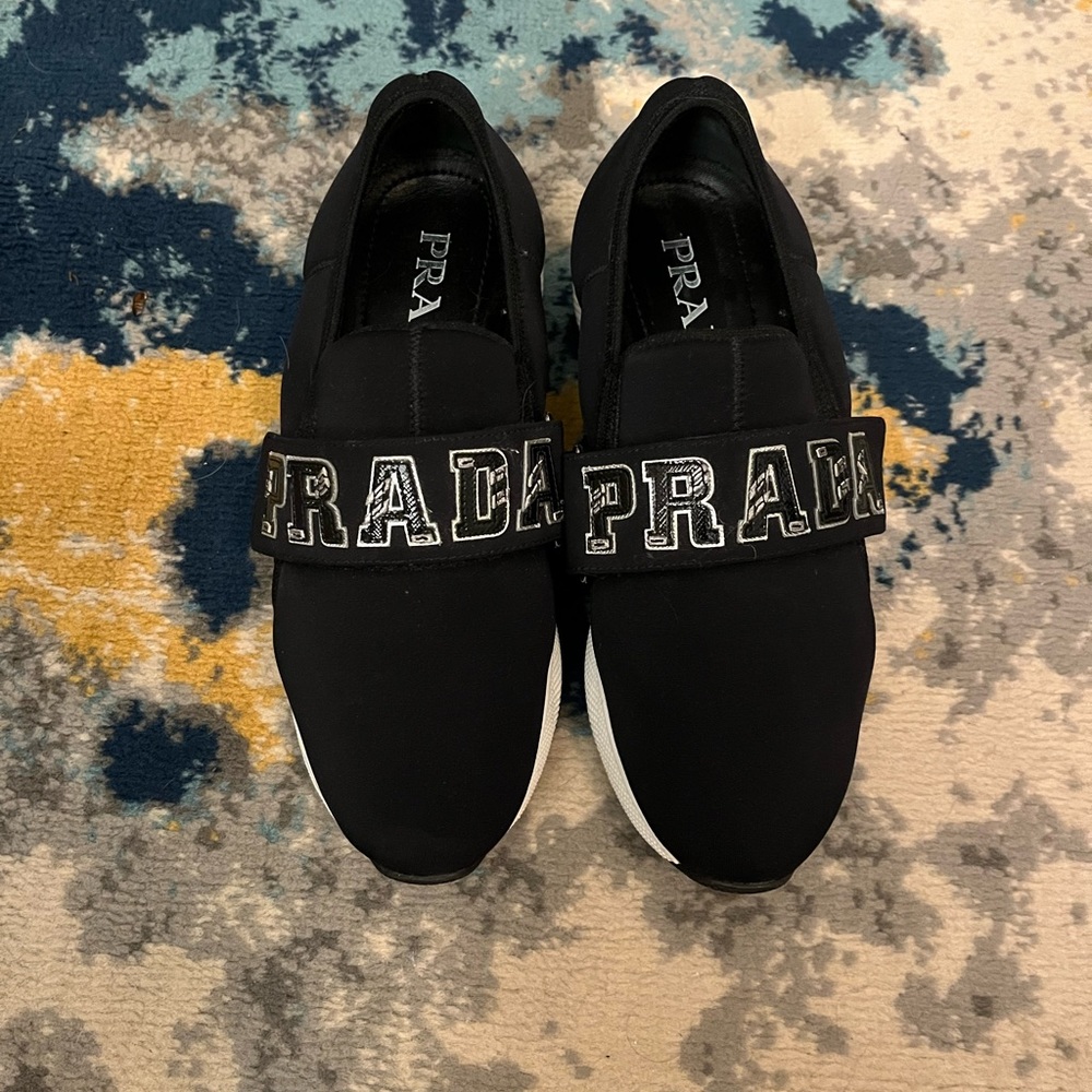 Womens Prada sneakers with velcro Prada brand name strap. Size IT 36.